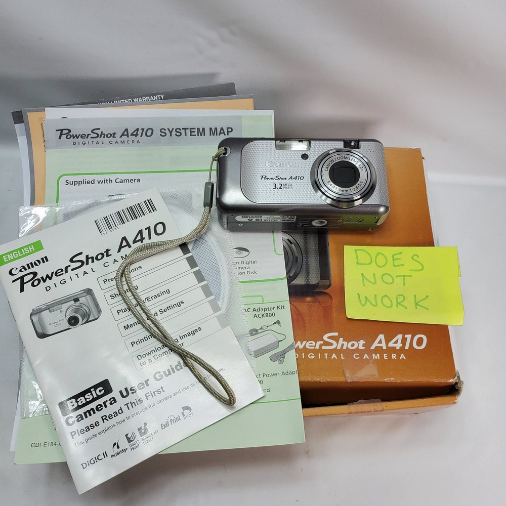 Canon PowerShot A410 Digital Camera Silver 3.2MP Point & Shoot FOR PARTS REPAIR